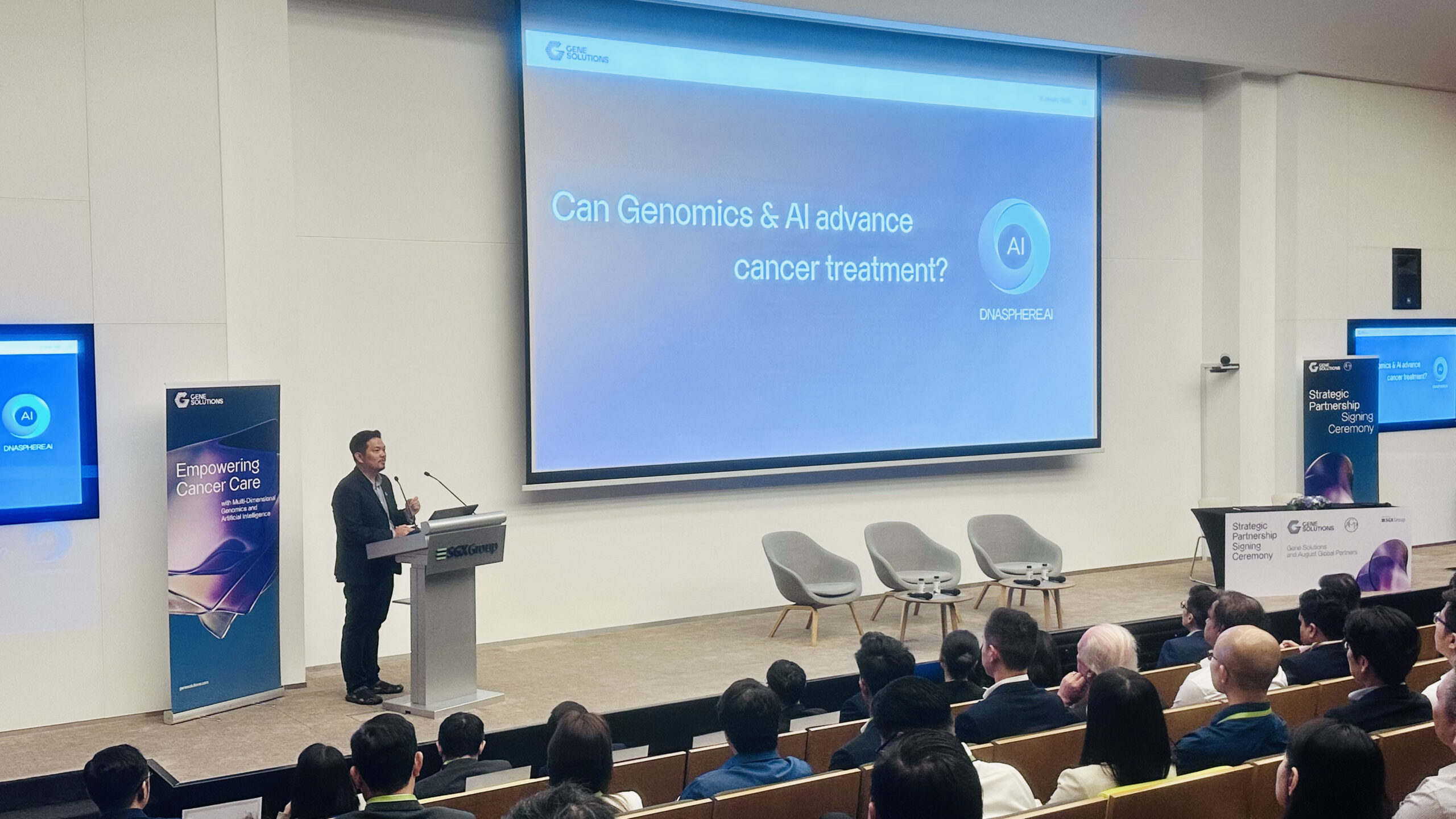 Dr. Nguyen Hoai Nghia, CEO of Gene Solutions, presenting on how genomics and AI can advance cancer treatment during a keynote speech at the SGX Auditorium, Singapore.